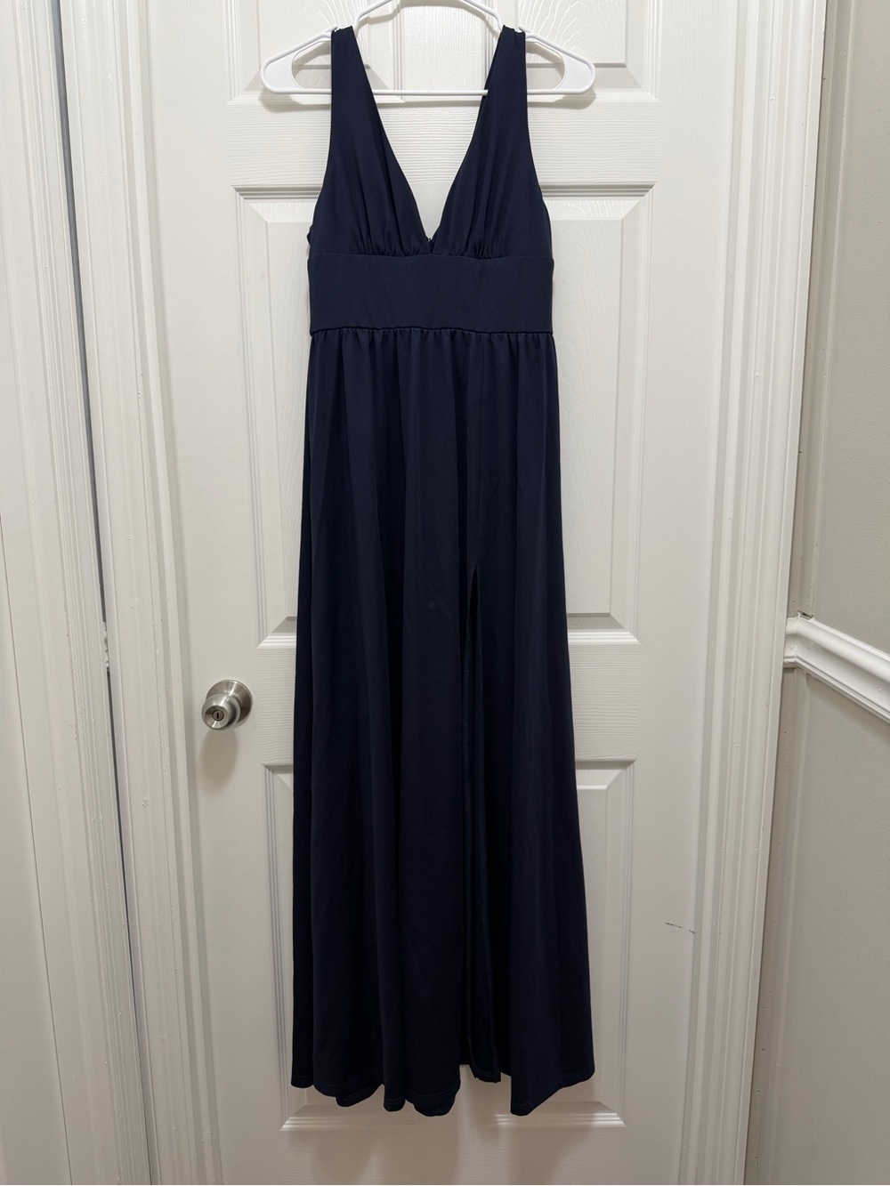Every pretty navy blue sleeveless dress